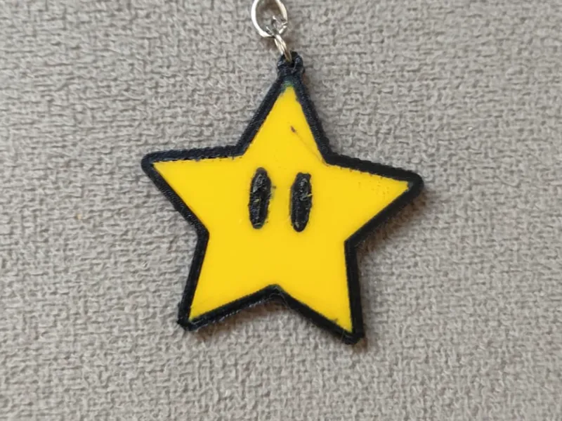 Chaveiro estrela super Mario