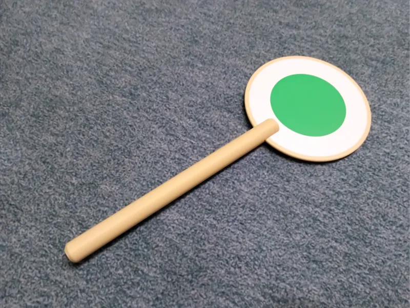 Train conductor sign with handle / Schafferkelle