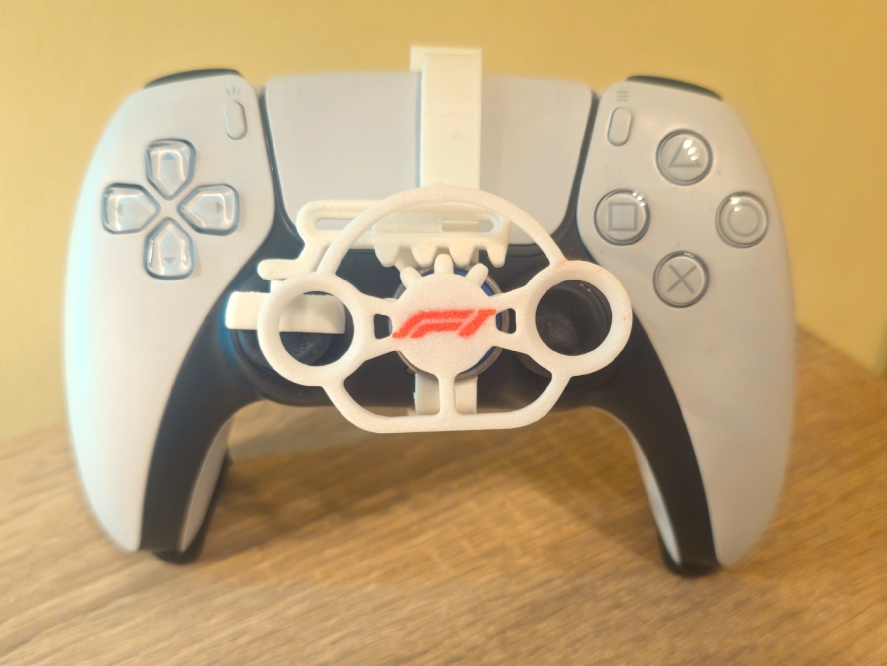 Miniatura 1 do modelo 3D PS5 controller mini wheel with logos