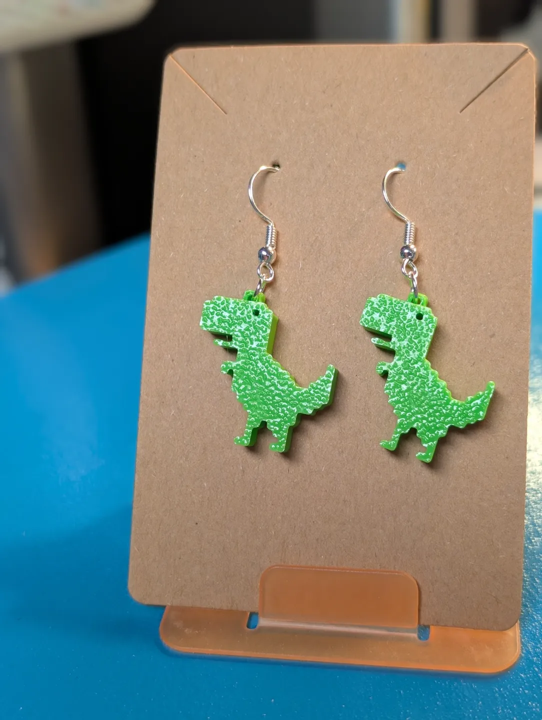 Chrome Dinosaur Earrings view 2
