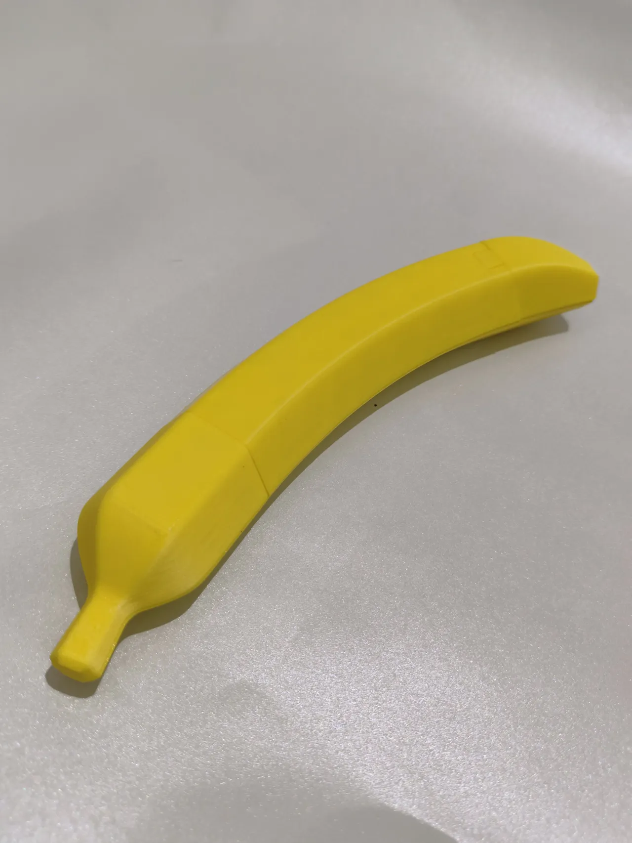 Banananife — Over-engineered OTF knife in banana view 3