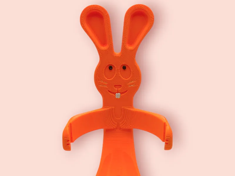 Bunny holding a kinder egg