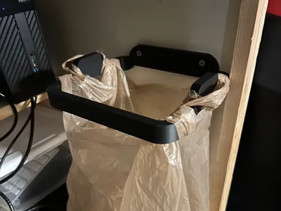 Desk mount trash bag holder