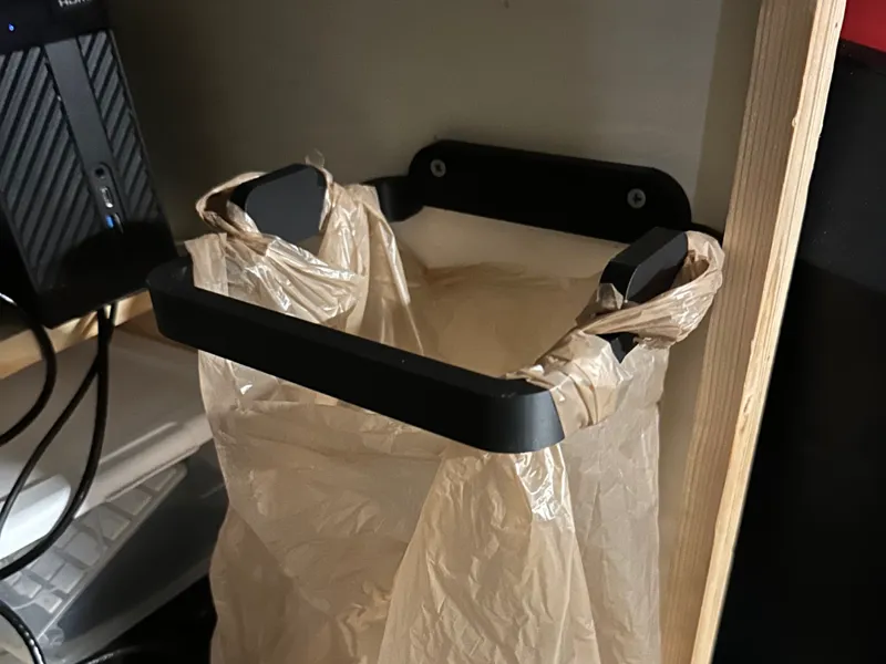 Desk mount trash bag holder