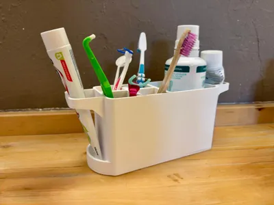 Bathroom organizer with toothpaste holder