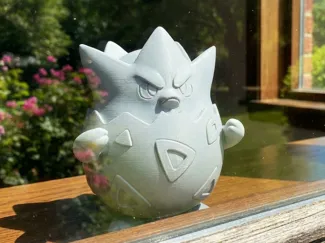 Togepi Engry  in the window