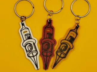 llavero aguja tattoo