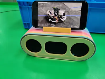 Bluetooth speaker + phone stand