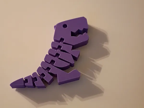 Porte-clés dinosaure flexible anti-stress