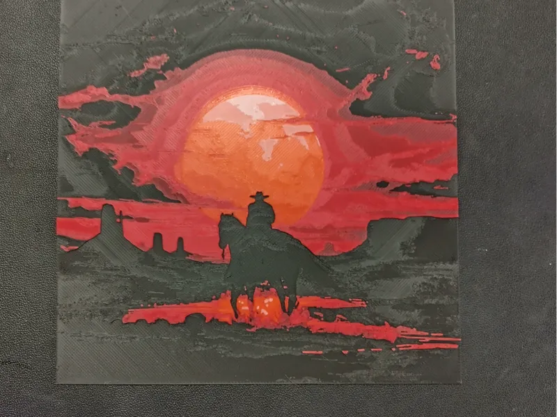 Cowboy Riding into Sunset