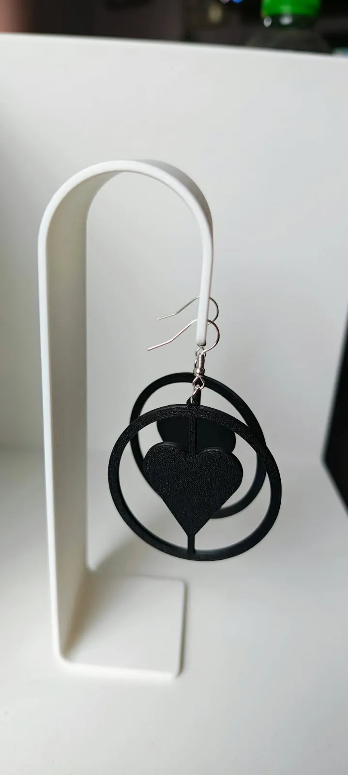 hoop earrings with a heart view 3
