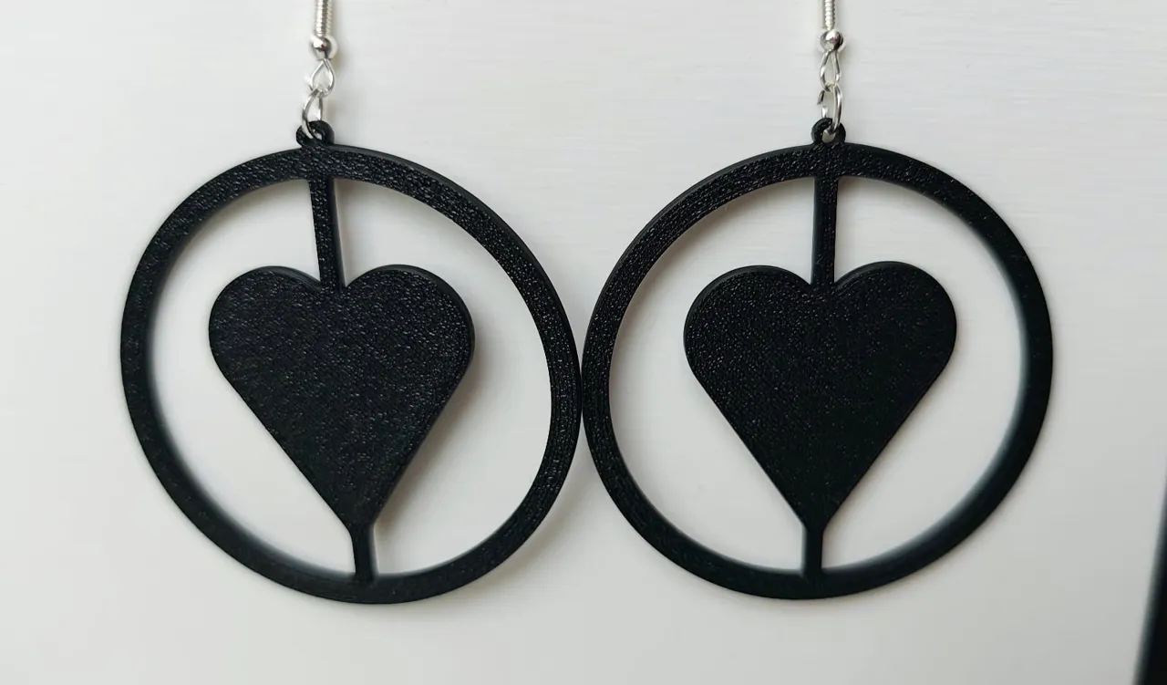 hoop earrings with a heart view 2