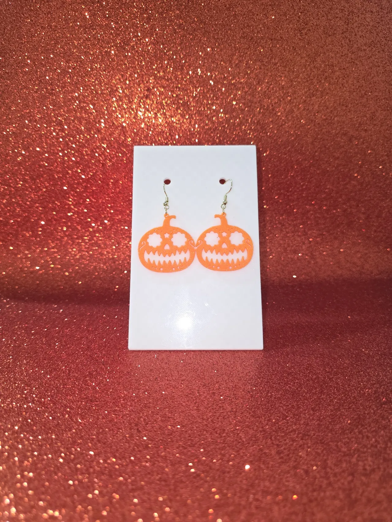 Calavera pumpkin earrings view 2