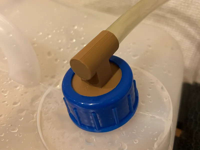 Dehumidifier drain hose adapter for water jug