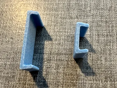Clips to keep build plate from warping. X1C