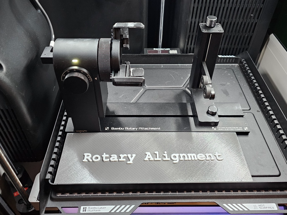 Rotary accessory alignment jig for laser platform