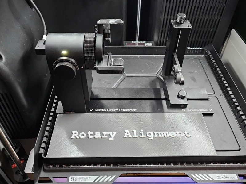 Rotary accessory alignment jig for laser platform