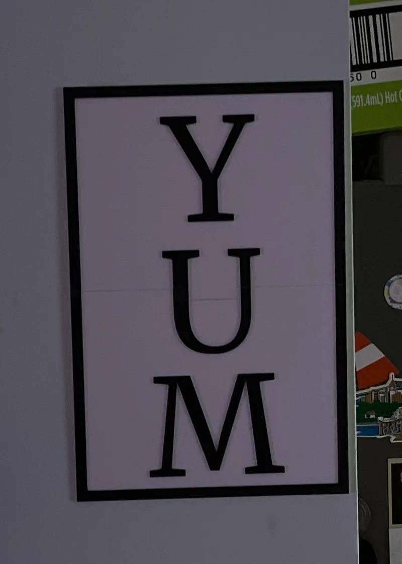 Yum wall sign