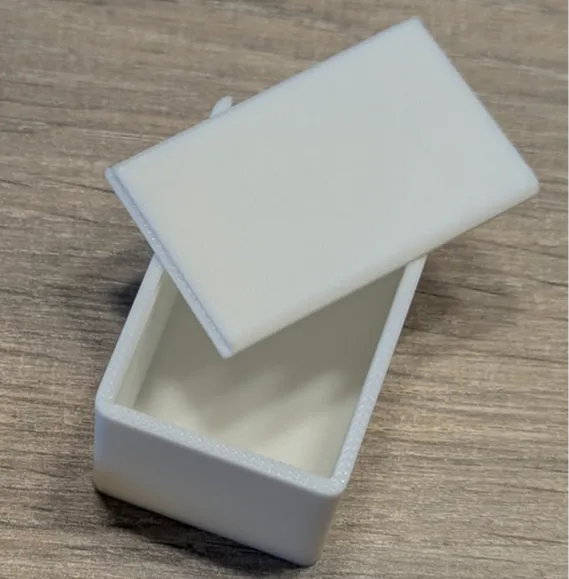 Box with rounded corners and sliding lid