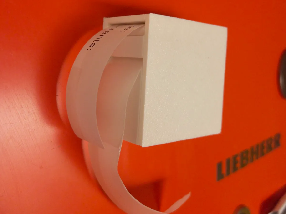 Distributeur d'étiquettes magnétique