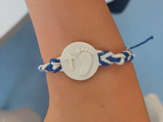 Bracelet with cross and footprint