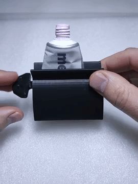 TOOTHPASTE SQUEEZER