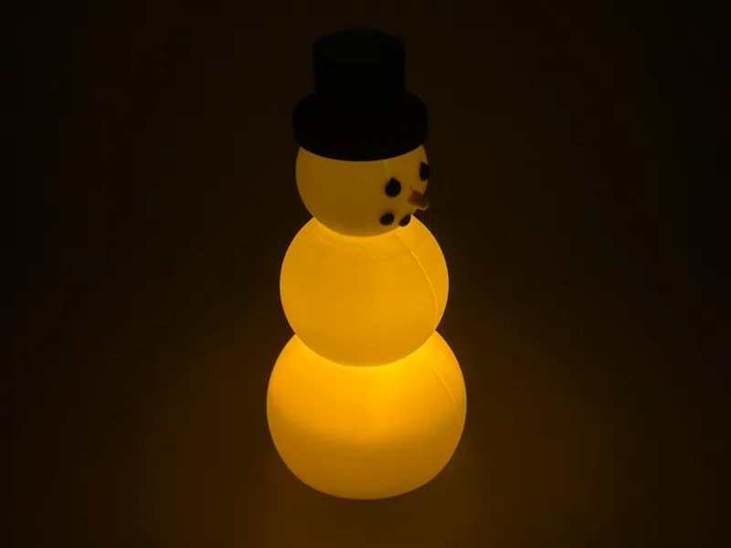 Glowing Snowman – LED Tealight Holiday Decoration