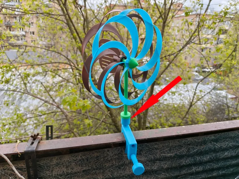 Adapter toroidal garden spinner to windmill clamp