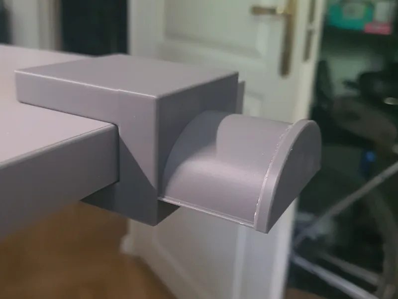 Headphones hanger for IKEA RODULF desk