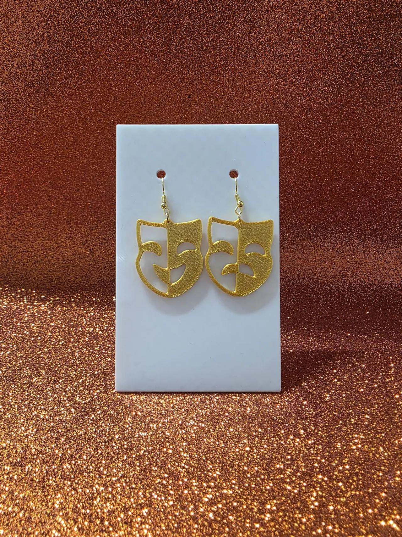 Happy-sad mask earrings view 2