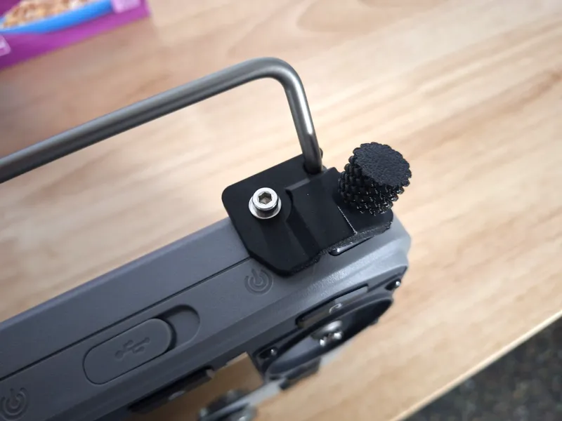 Mowrator remote control mowing button holder