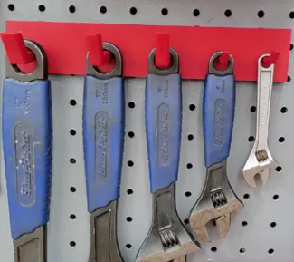 Crescent wrench holder for peg board