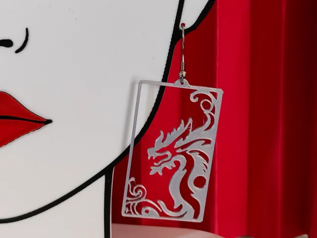Dragon in frame earrings - openwork