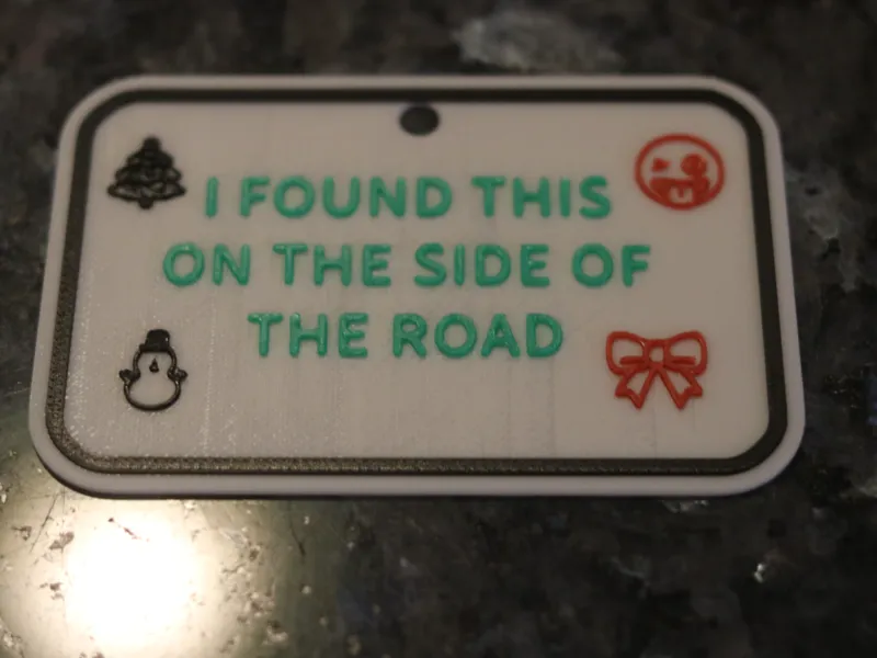 GIFT TAG FOUND ON THE SIDE OF THE ROAD