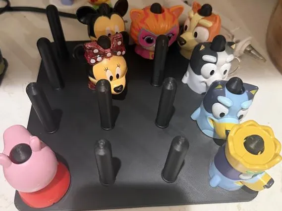Range-bouchons personnages pour gourdes