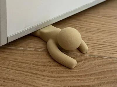 "HELP ME!" - The Most Dramatic Door Stopper