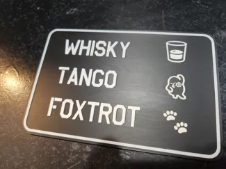 Whisky Tango Foxtrot sign