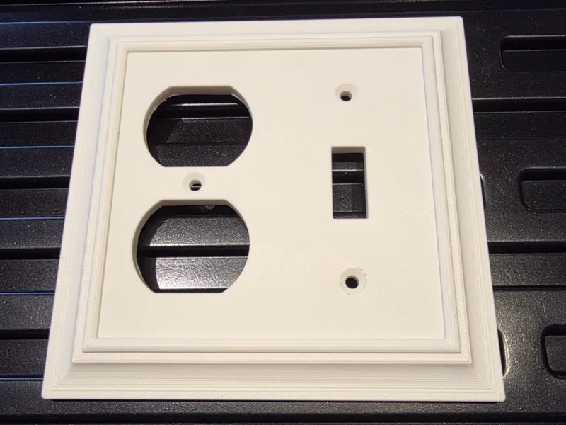 Decorative Toggle and Outlet Combo Cover Plate