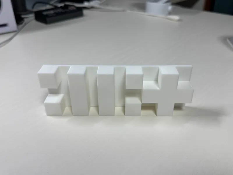 ILLIT 3D logo sign