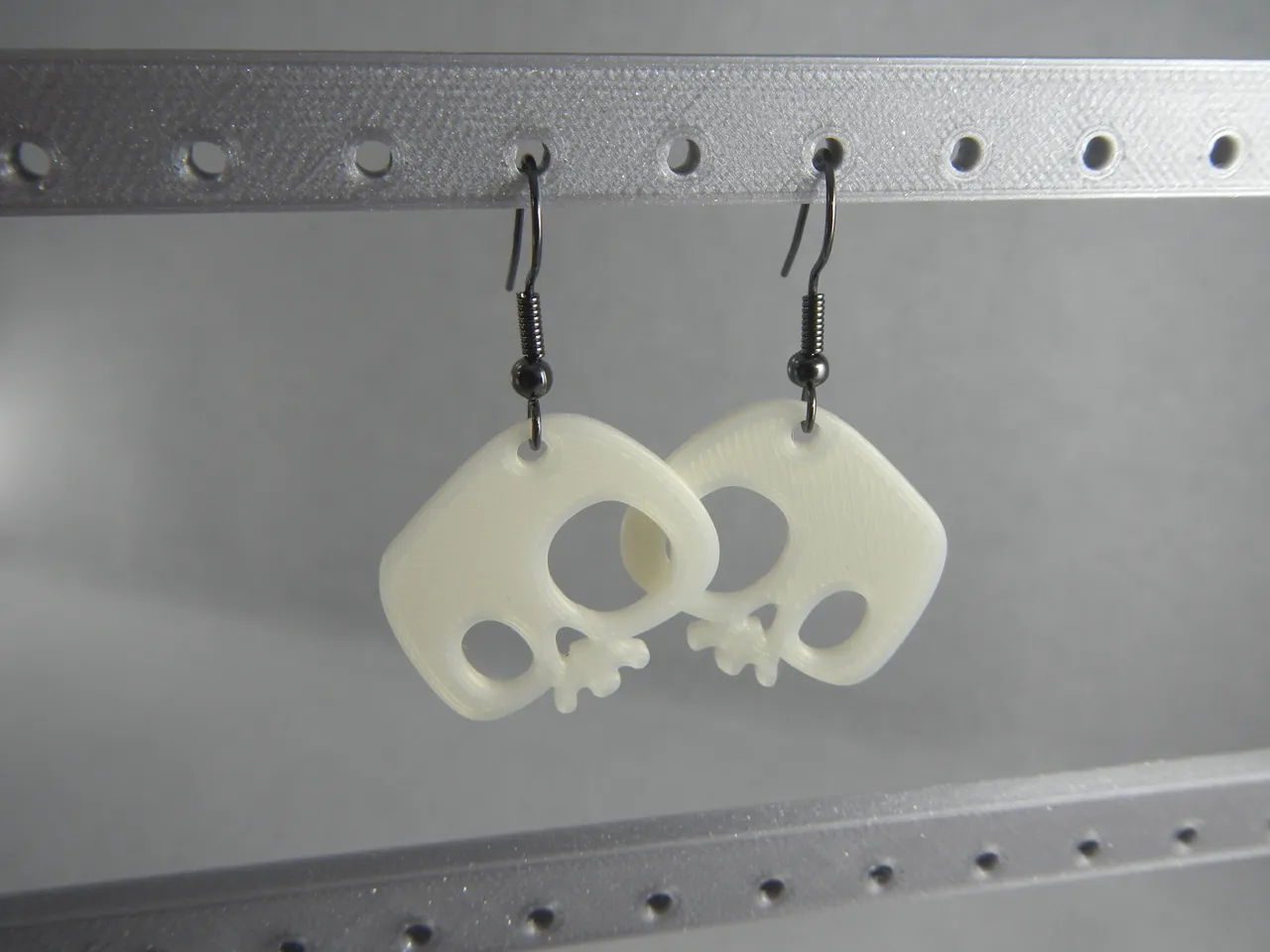 Skull earrings view 2