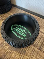 With Land Rover logo