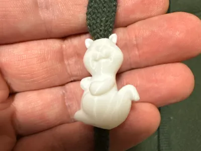 Cord stopper with squirrel
