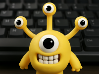 Cute Yellow Four-Eyed Alien Toy 3D Print Model