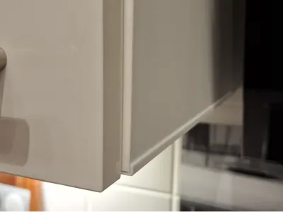 Edge protection, steam protection for kitchen cabinet