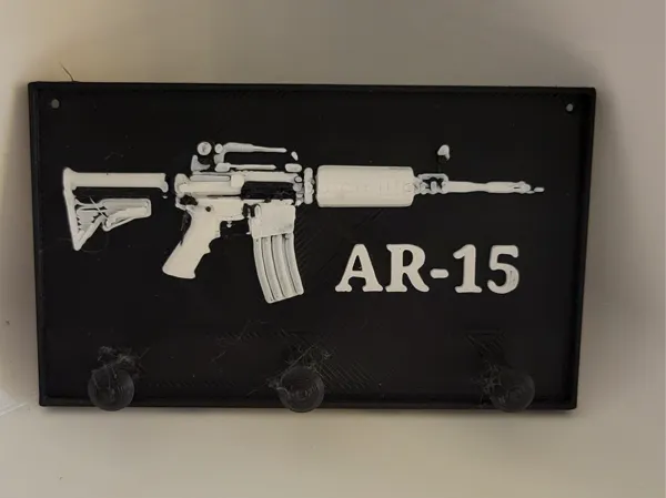 Porte-clés silhouette de fusil gravé