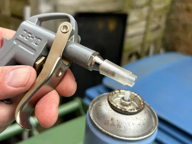 Aerosol spray can charger