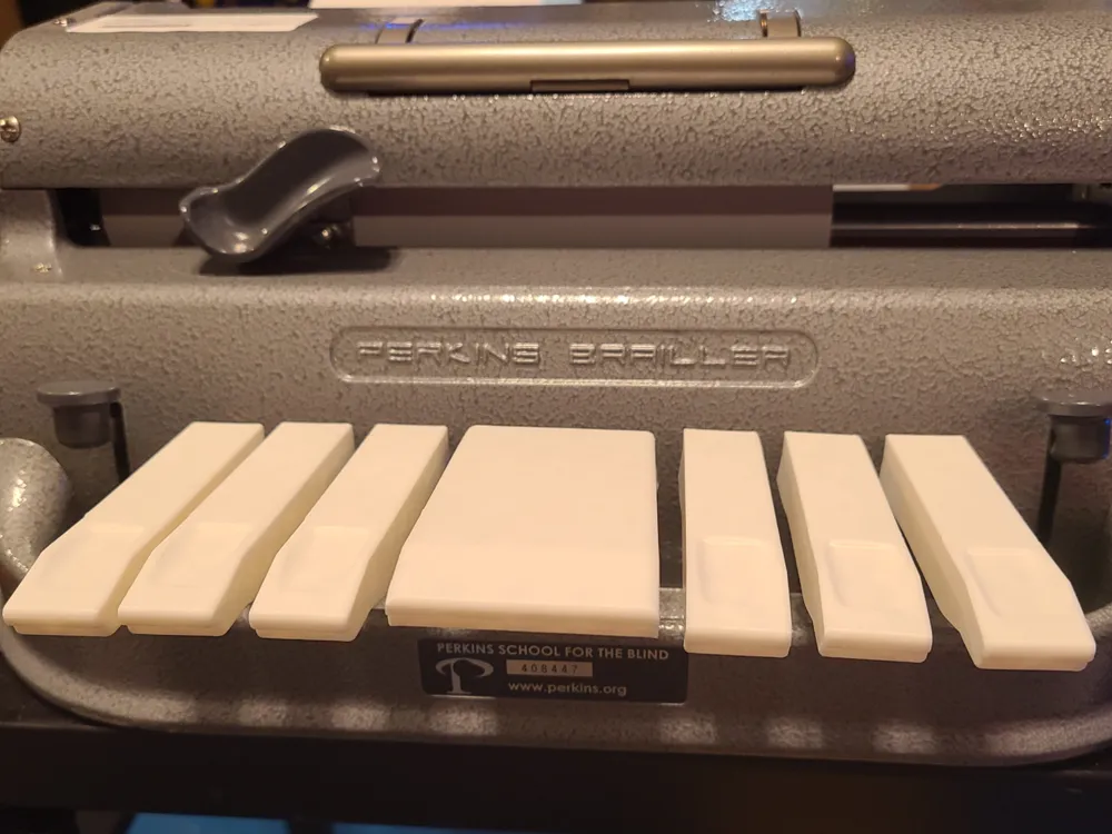 Modelo para impresión 3D: Perkins brailler key extensions. Referencia del modelo original.