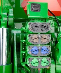 Replacement dust cover for hydraulic outlets on John Deere tractors.