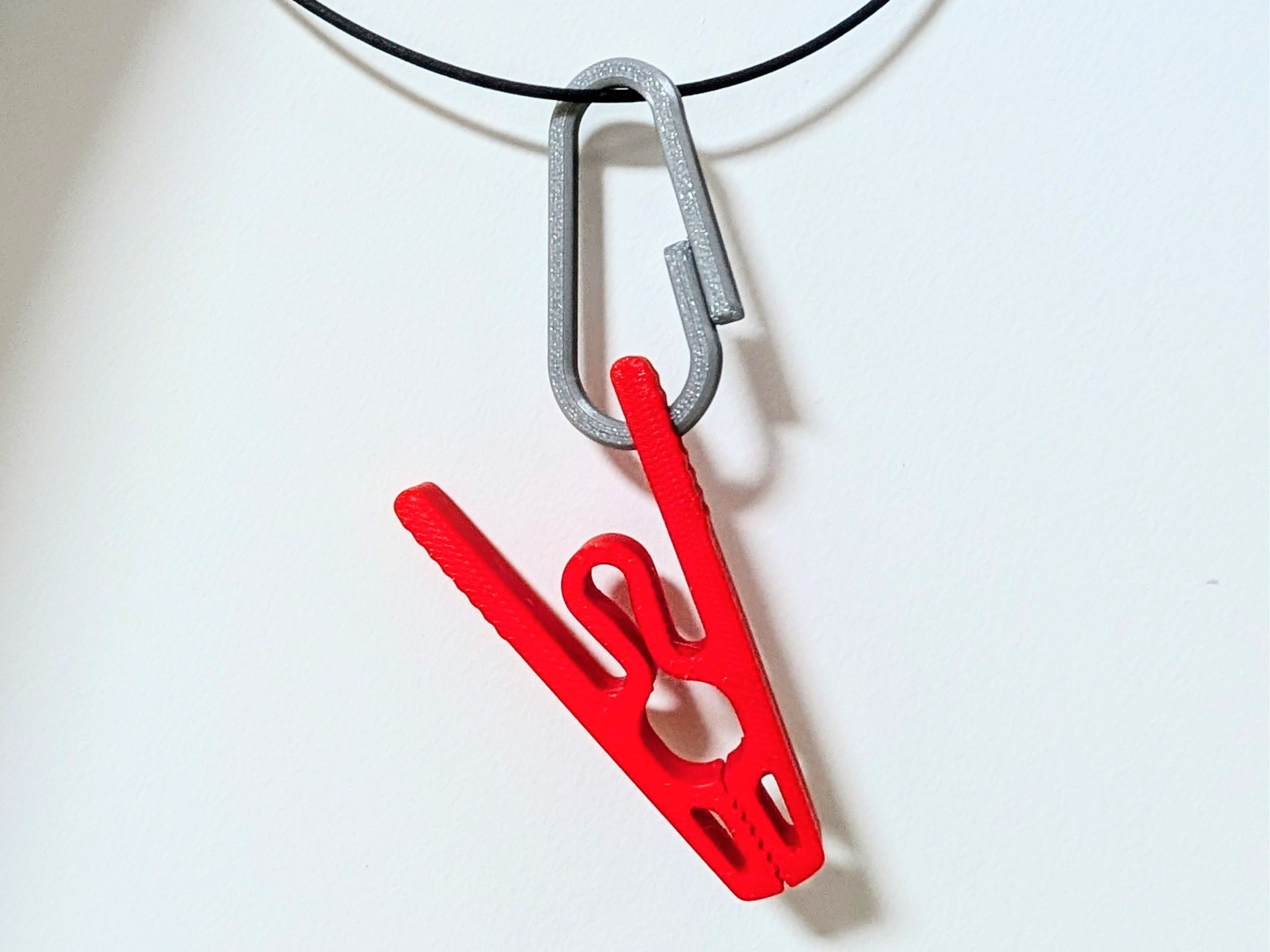 Compliant Clip with Detachable Snap Hook