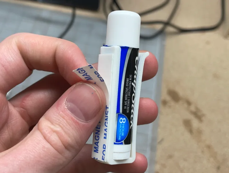 ChapClip Stick -- Adhesive chapstick holder